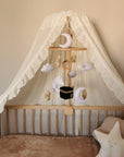 Support en bois pour mobile bébé – pratique et sécurisé